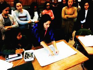 Laura Volpintesta teaches model drawing and Fashion illustration to a group of prospective college students in Danbury, Ct.