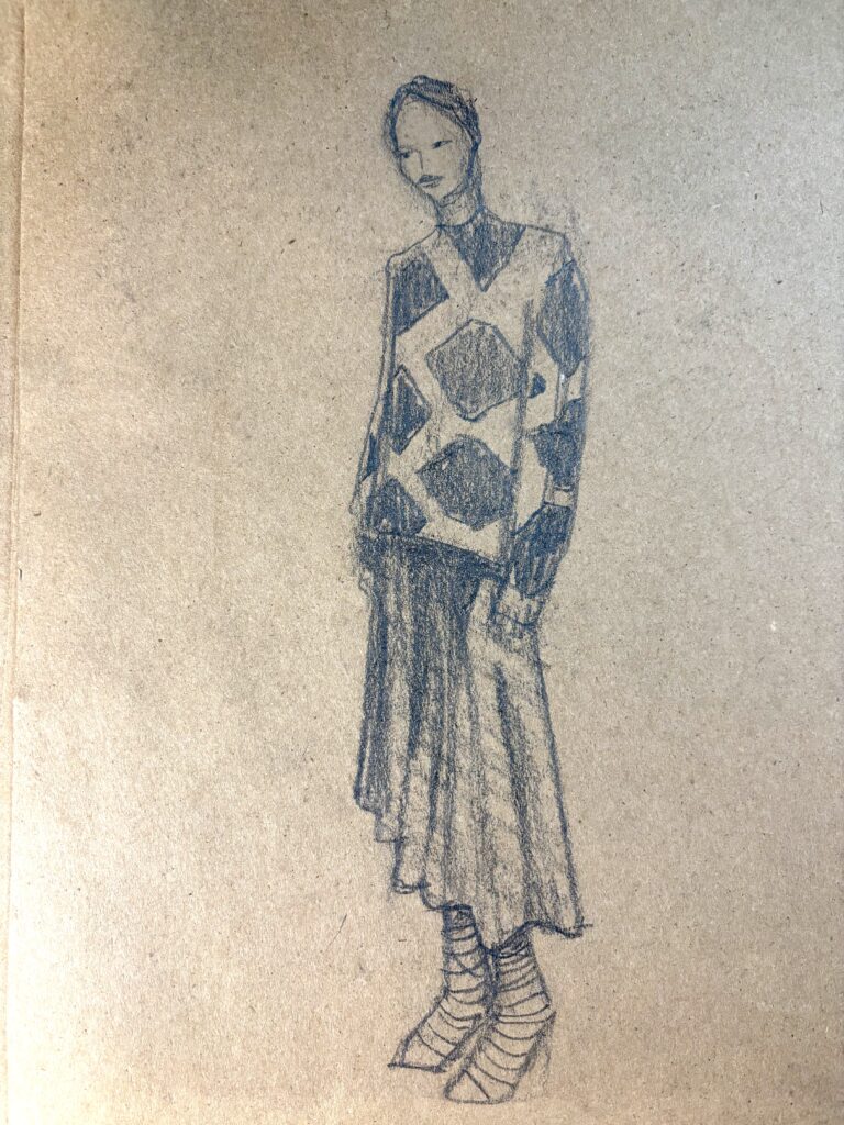 fashion sketch, sweater and asymmetrical skirt on toned paper with pencil by Laura Volpintesta
